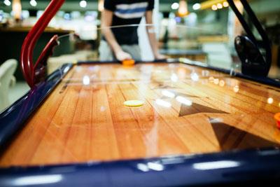Air hockey table in a recreation center